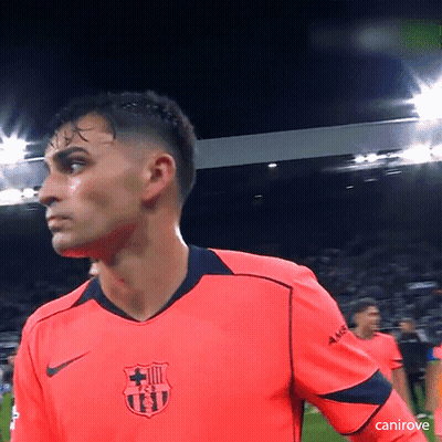 A Soccer Player Wearing A Bright Pink Shirt With A Fcb Logo On It GIF