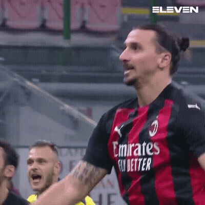 A Soccer Player Wearing A Emirates Fly Better Jersey Is Celebrating A Goal GIF