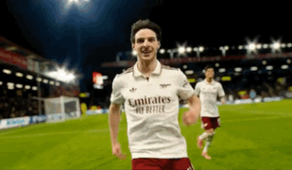 A Soccer Player Wearing A Emirates Fly Better Shirt GIF