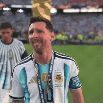 A Soccer Player Wearing A Fifa World Cup Trophy Around His Neck GIF