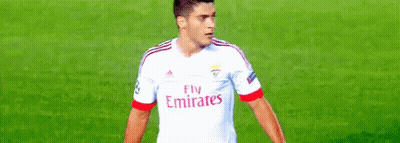 A Soccer Player Wearing A Fly Emirates Jersey GIF