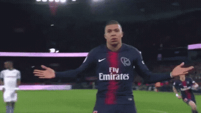 A Soccer Player Wearing A Fly Emirates Jersey Celebrates A Goal GIF