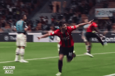 A Soccer Player Wearing A Fly Emirates Jersey Is Running On The Field GIF