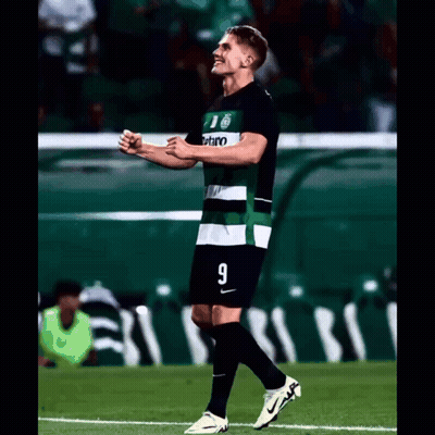 A Soccer Player Wearing A Green And White Jersey With The Number 9 On It GIF