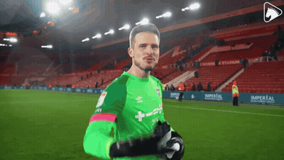A Soccer Player Wearing A Green Jersey That Says Umbro GIF