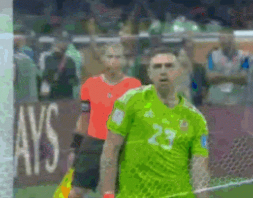 A Soccer Player Wearing A Green Jersey With The Number 23 GIF