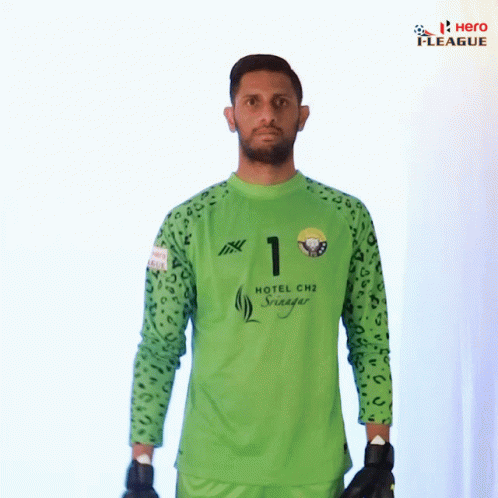 A Soccer Player Wearing A Green Shirt With The Number 1 On It GIF