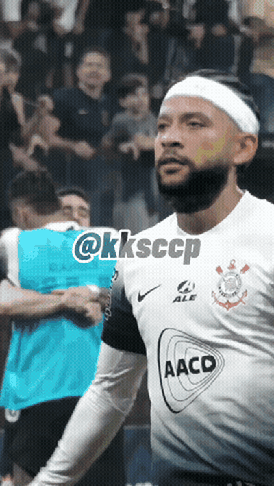 a soccer player wearing a headband with the word aacd on the front