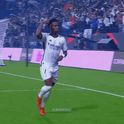 A Soccer Player Wearing A Jersey That Says Fly Emirates On It GIF