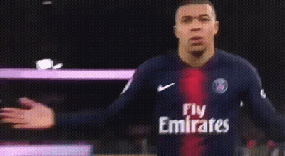 A Soccer Player Wearing A Jersey That Says Fly Emirates On It GIF
