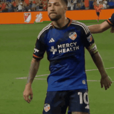 A Soccer Player Wearing A Jersey That Says Mercy Health On It GIF
