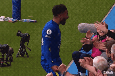 A Soccer Player Wearing A Jersey That Says No Room For Racism On The Sleeve GIF