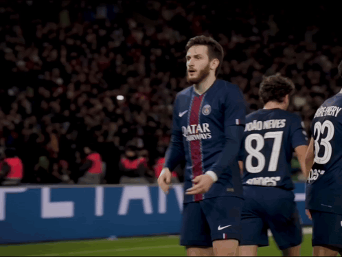A Soccer Player Wearing A Jersey That Says Qatar On The Front GIF