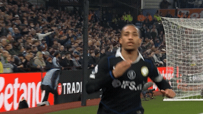 A Soccer Player Wearing A Jersey That Says Tradi GIF