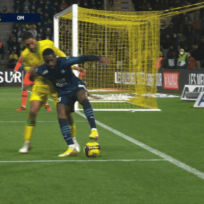 A Soccer Player Wearing A Jersey That Says Uber Eats On It Kicks The Ball GIF