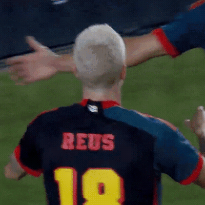 A Soccer Player Wearing A Jersey With The Number 18 On It GIF