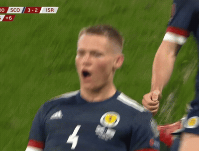 A Soccer Player Wearing A Jersey With The Number 4 GIF