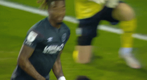 A Soccer Player Wearing A Jersey With The Number 6 On The Sleeve GIF