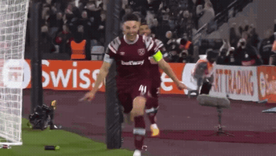 A Soccer Player Wearing A Maroon Jersey With The Number 41 On It Celebrates A Goal GIF