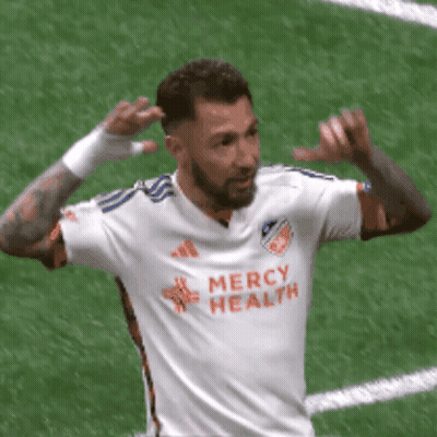 A Soccer Player Wearing A Mercy Health Jersey Celebrates A Goal GIF