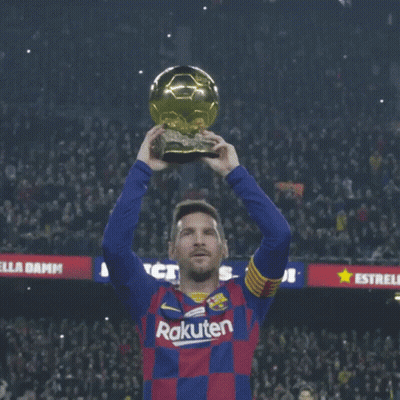 A Soccer Player Wearing A Number 10 Jersey Holds Up A Golden Ball GIF