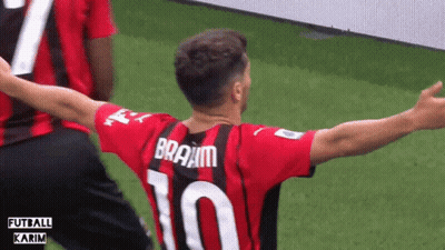 A Soccer Player Wearing A Number 10 Jersey Is Celebrating GIF