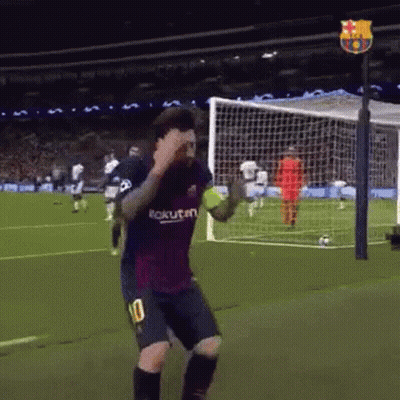 A Soccer Player Wearing A Number 10 Jersey Is Dancing On The Field . GIF