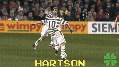 A Soccer Player Wearing A Number 10 Jersey Is Jumping In The Air GIF