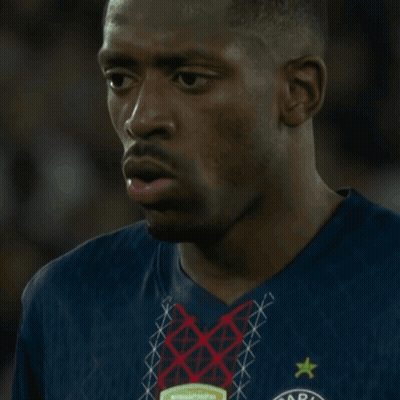 A Soccer Player Wearing A Number 10 Jersey Kicks The Ball GIF