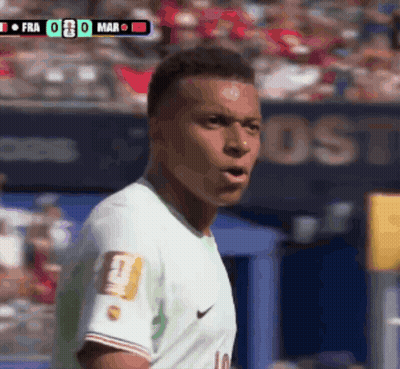 A Soccer Player Wearing A Number 10 Jersey Stands In Front Of A Scoreboard GIF