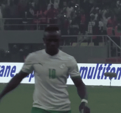 A Soccer Player Wearing A Number 10 Jersey Stands On The Field GIF