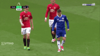 A Soccer Player Wearing A Number 10 Jersey Stands On The Field GIF