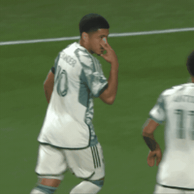 A Soccer Player Wearing A Number 10 Jersey Wipes His Nose GIF