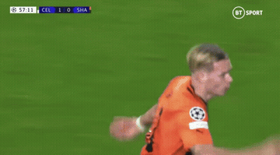 A Soccer Player Wearing A Number 11 Jersey Is Running On The Field GIF