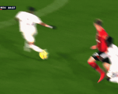 A Soccer Player Wearing A Number 2 Jersey Runs On The Field GIF