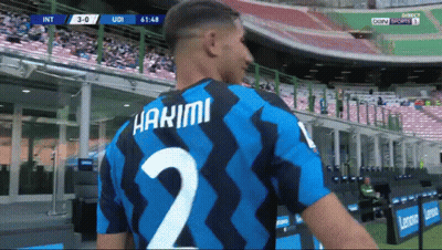 A Soccer Player Wearing A Number 2 Jersey Stands In A Stadium GIF