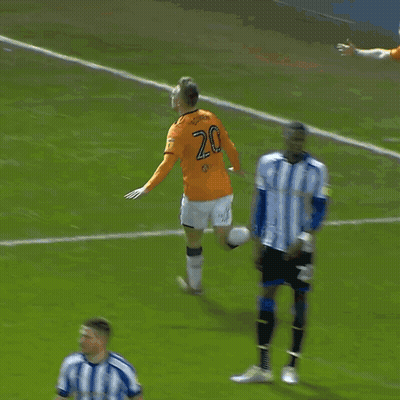 A Soccer Player Wearing A Number 21 Jersey Jumps In The Air GIF