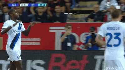 A Soccer Player Wearing A Number 23 Jersey Stands Next To Another Player GIF