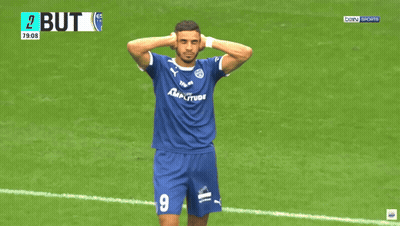 A Soccer Player Wearing A Number 25 Jersey Stands On The Field GIF