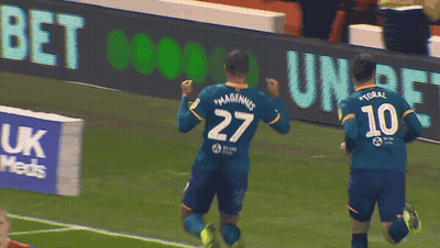 A Soccer Player Wearing A Number 27 Jersey Celebrates A Goal GIF
