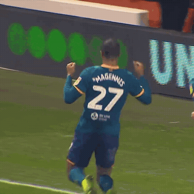 A Soccer Player Wearing A Number 27 Jersey Kneeling On The Field GIF
