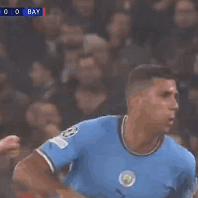 A Soccer Player Wearing A Number 5 Jersey Is Kicking The Ball GIF