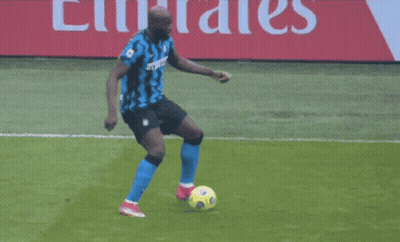 A Soccer Player Wearing A Number 7 Jersey Is Being Tackled By Another Player GIF