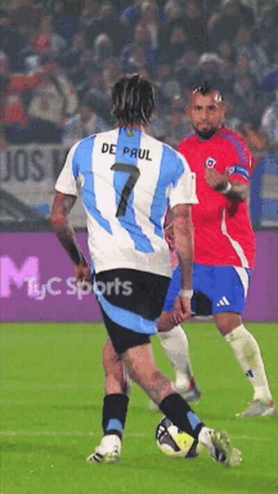 A Soccer Player Wearing A Number 7 Jersey Kicks A Ball GIF
