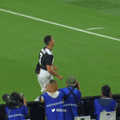 A Soccer Player Wearing A Number 7 Jersey Stands On The Field GIF
