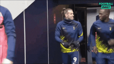A Soccer Player Wearing A Number 9 Jersey Is Standing In A Locker Room GIF