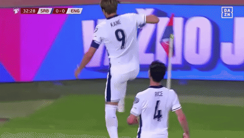 A Soccer Player Wearing A Number 9 Jersey Jumps In The Air GIF