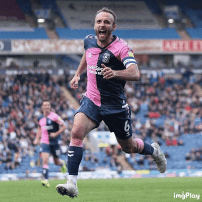 A Soccer Player Wearing A Pink And Blue Uniform With The Number 6 On It GIF