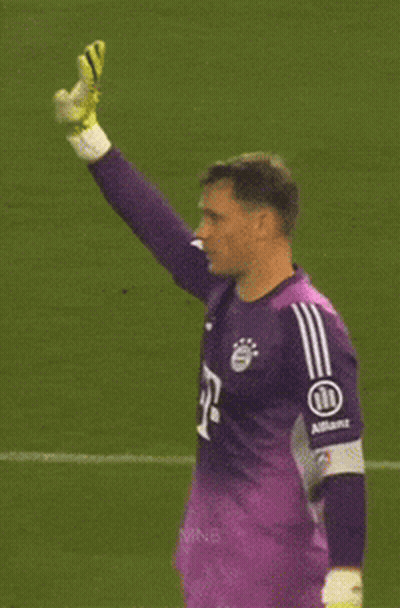 A Soccer Player Wearing A Purple Jersey That Says Allianz On The Sleeve GIF