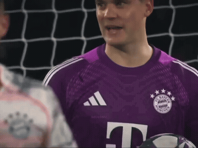 A Soccer Player Wearing A Purple Jersey With The Letter T On The Front GIF